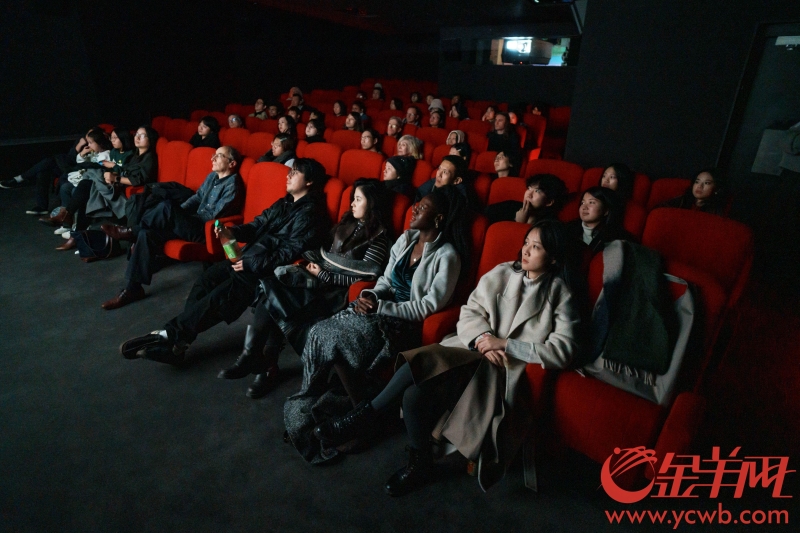 The audience attentively watches the Maritime short films.